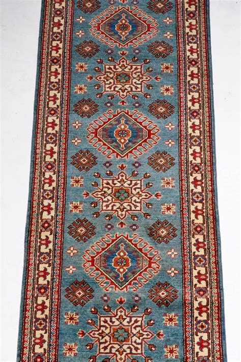 You should have between 4 and 5 inches of floor visible around your rug. Contemporary Pakistani Kazak Style Runner Rug For Sale at ...