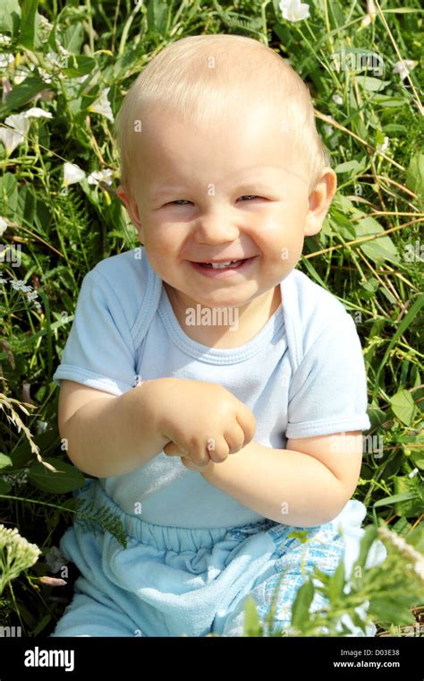 Adorable Baby Boy Outdoors At Sunny Summer Day Stock Photo Alamy
