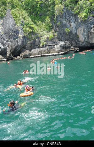 Swimmers Returning From Morakot Cave Emerald Cave The Island Of Koh Mook Also Known As Ko Muk