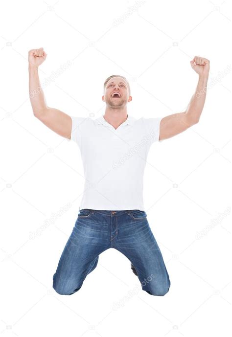 Excited Man Cheering In Jubilation Dropping Down On His Knees — Stock