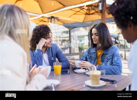 Company Of Diverse Friendly People In Summer Cafe Stock Photo Alamy