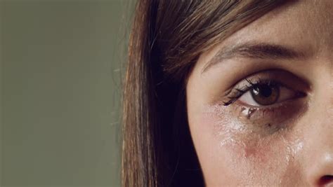 tears in a female girl sad eye crying woman stock footage video 13747682 shutterstock
