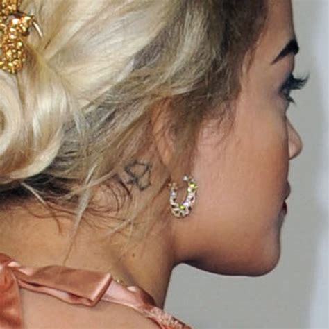 The star tattoo behind the ear is so perfect because the star itself is an easy, elementary, design. Rita Ora's 9 Tattoos & Meanings | Steal Her Style