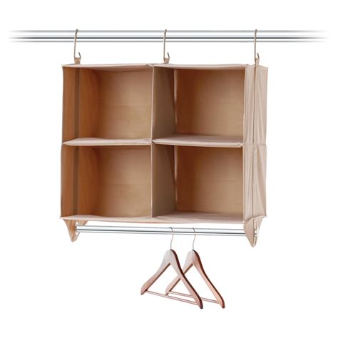 A top shelf above the organizer for out of season items in a full length width, so fits many size totes, bins or baskets. NEATFREAK 4-Shelf Closet Organizer 24.2" x 15" x 27.6" | RONA