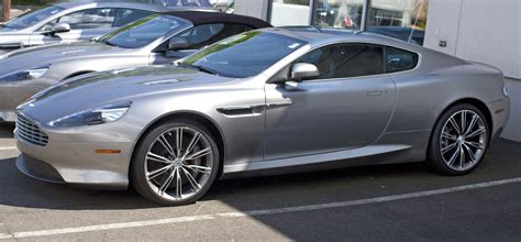The 2012 aston martin virage coupe ($tba) is meant as a compromise between the elegance of the db9 and the sportiness of the dbs, featuring a. File:2012 Aston Martin Virage coupé.jpg - Wikimedia Commons