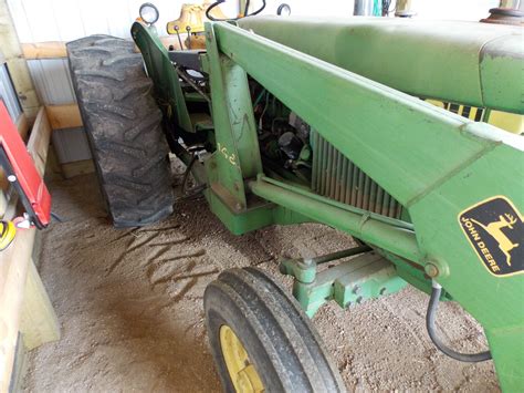 John Deere Model 2140 Tractor With Model 148 Front End Loader Bale