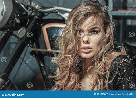Sensual Woman Girl Face Sitting Near Motorcycle On Garage Background Motorcycling Hobby And