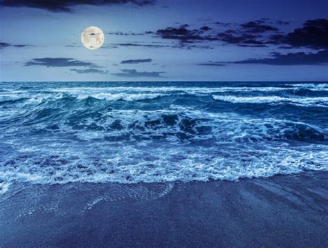 Sea Waves Running On Sandy Beach At Night — Stock Photo © Pellinni