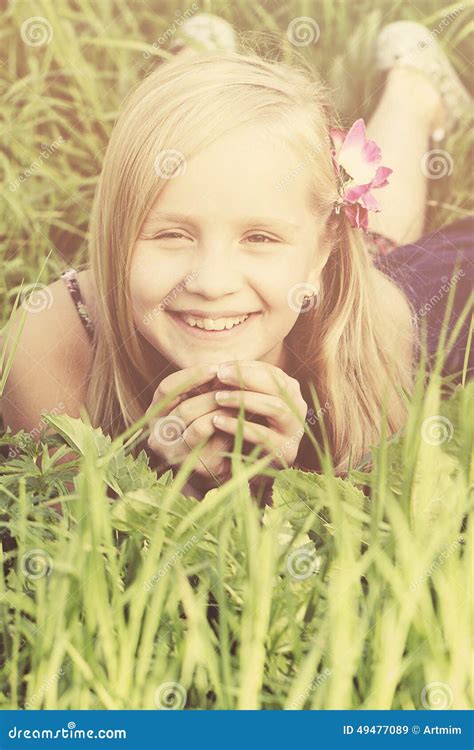 Carefree Smiling Blonde Girl On Grass Stock Image Image Of Grass Green