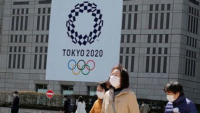 Los aros olímpicos cerca del nuevo estadio nacional de tokio. Logotipo Juegos Olimpicos Tokio 2021 / Juegos Olimpicos 2021 Descubre Todo Acerca De Tokio 2021 ...