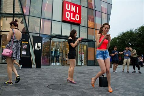 four detained after video posted online of couple having sex in beijing uniqlo