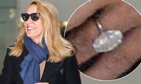 jerry hall flashes her diamond engagement ring at heathrow airport daily mail online