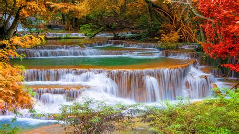 Thailand Kanchanaburi Cascade Waterfall In Autumn Trees With Autumn Red