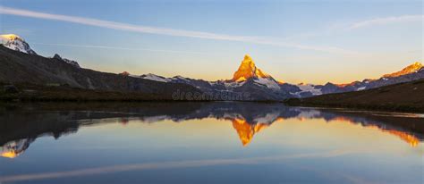 Matterhorn Peak At Sunrise With Reflection In A Lake In Summer Stock