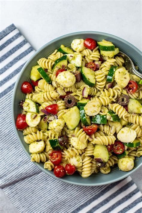 Adding chicken and green beans to this easy chicken pasta recipe makes it a great weeknight supper. Pesto Pasta Salad Recipe | Kitchen Swagger