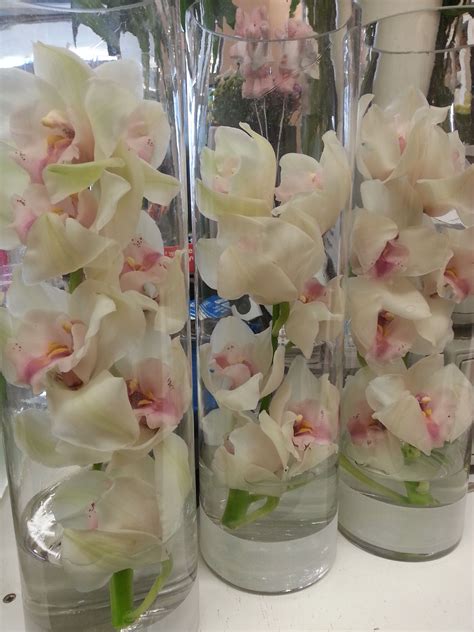 White Cymbidium Orchids In A Tall Vase Vase Crafts Diy Vase Rustic Vase
