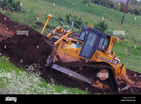 A Caterpillar D6t Lgp Stripping Top Soil As Work Begins On The