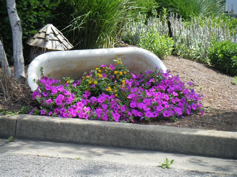 Check out our fairy garden bathtub selection for the very best in unique or custom, handmade pieces from our garden decoration shops. Great idea for an old bathtub. | Garden tub, Garden ...