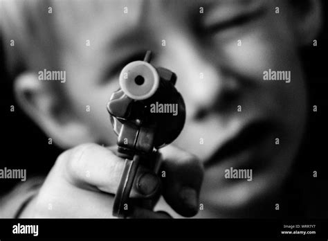 Hand Holding Gun Close Up Hi Res Stock Photography And Images Alamy
