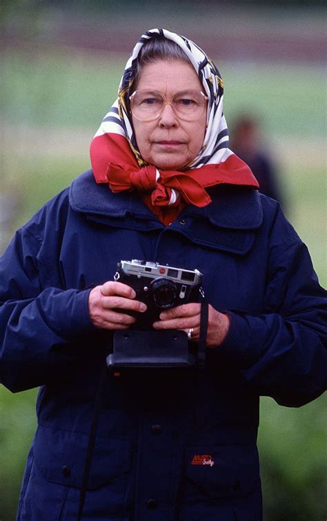 Queen Elizabeth Ll Holds Her Camera During The Royal Windsor Horse