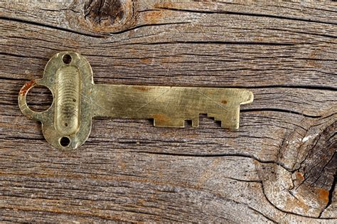 Vintage Key On Rustic Wood High Quality Abstract Stock Photos
