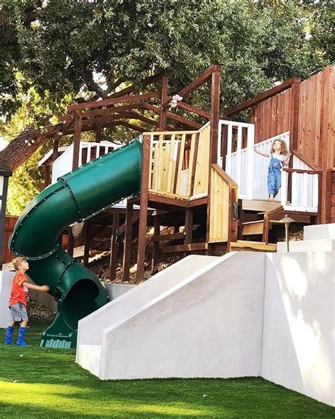 Backyard Hillside Playhouse And Structure Backyard Backyard For Kids