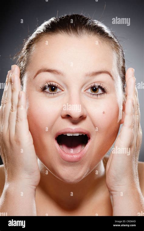 Young Woman With Surprised Look Stock Photo Alamy