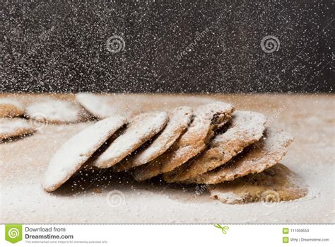 Homemade Cookies With Falling Powdered Sugar Stock Image
