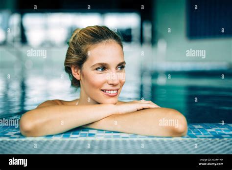 Portrait Of Beautiful Woman Relaxing In Swimming Pool Stock Photo Alamy