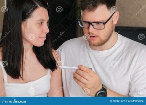 Worried Couple Looking At Positive Pregnancy Test Stock Image Image