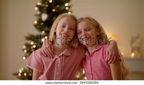 Close Portrait Two Twin Sisters Hugging Stock Photo 1845088384