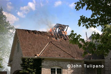 House Fire With Cedar Shake Roof Shingles