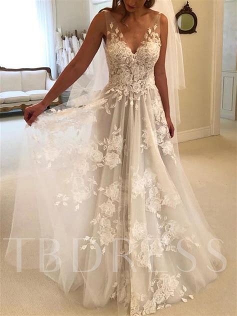 We have looked all over the web for the most stunning and appropriate beach informal wedding dresses and casual beach wedding dresses are perfect options for a destination wedding. Sleeveless V-Neck Appliques Beach Country Wedding Dress ...
