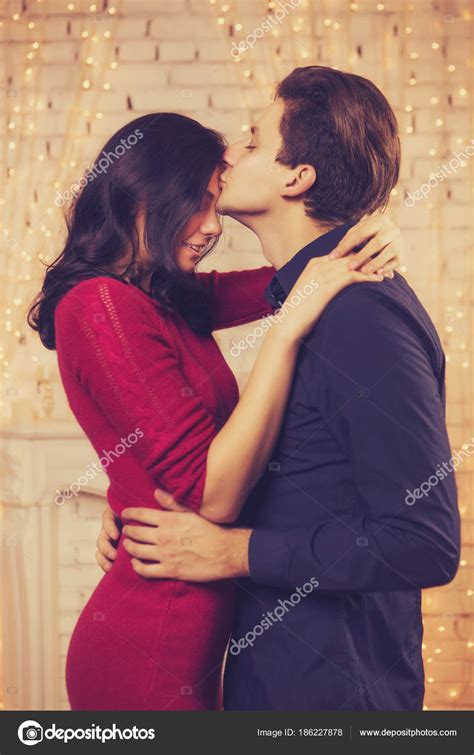 Beautiful Brunette Caucasian Romantic Loving Couple In Cozy Warm