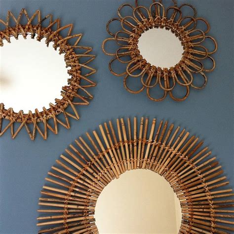 Product titlehanging wall mirror rattan round makeup mirror nordi. set of five rattan sunburst mirrors by the forest & co ...