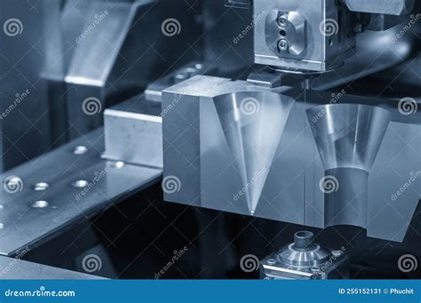 The Wire Edm Machine Cutting The Mold Insert Parts Stock Image Image