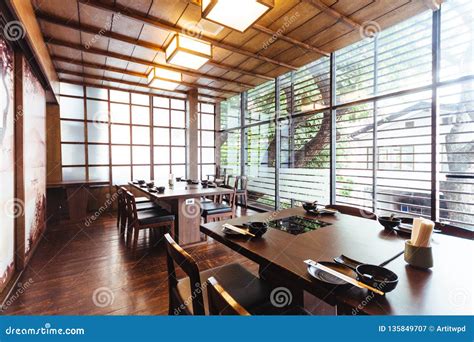 Japanese Restaurant With Wooden Decorated Large Glass Window For