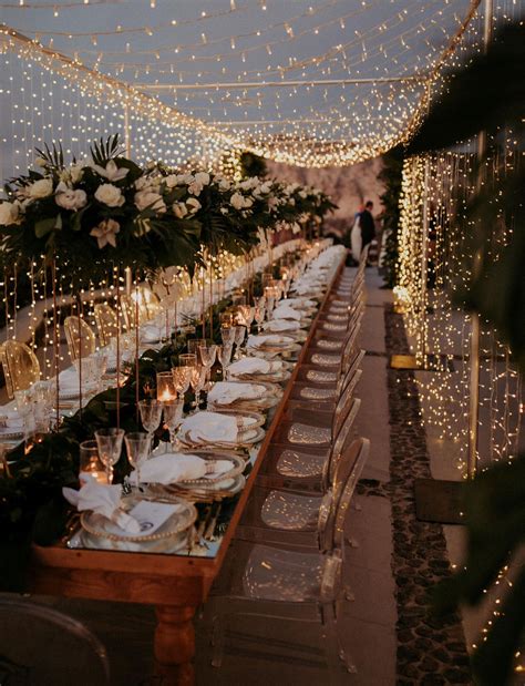 A Magical Santorini Wedding With Fairy Lights Tropical Florals