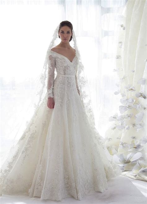 The idea of dressing not only glamorous but cozy too has me asking for snowy flurries sooner than later. Long Sleeve Lace Wedding Dress | DressedUpGirl.com