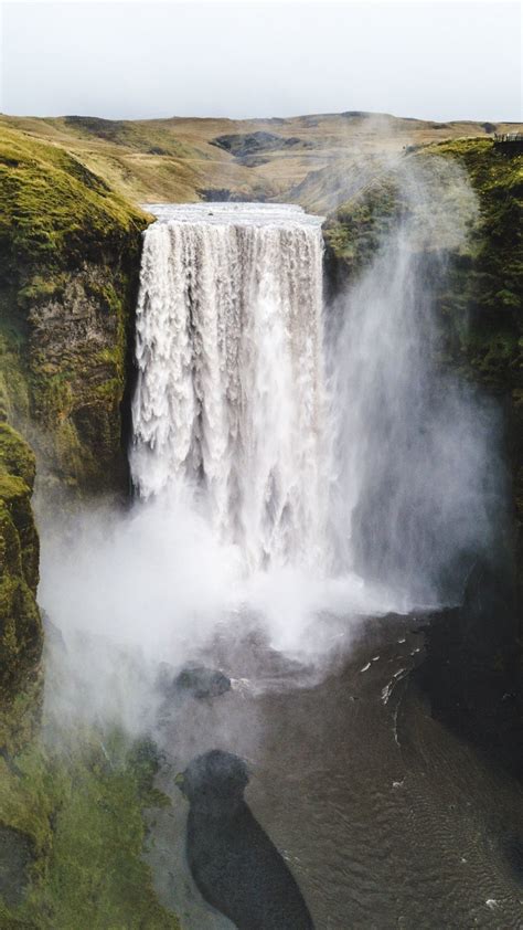 Download Wallpaper 1080x1920 Nature Waterfall Greenfield Skogafoss
