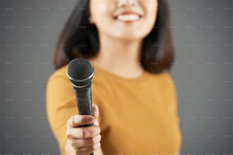 Woman Giving Young Microphone Stock Photos Motion Array