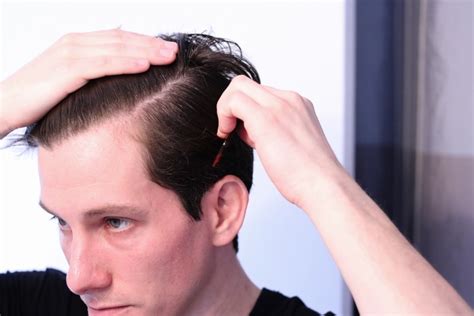 Using the comb, separate the hair along one of the lines to create the parting. Which Side Should Men Comb & Part Their Hair? | Man of Many