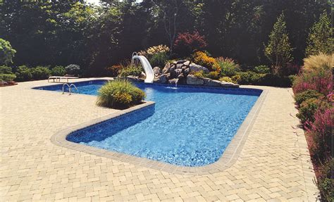 Simply, sit with your partner on these the beautiful small cascade with the water slide are making it a perfect pool suggested for every home. Inground Pool Cover Types - Swimming pools photos