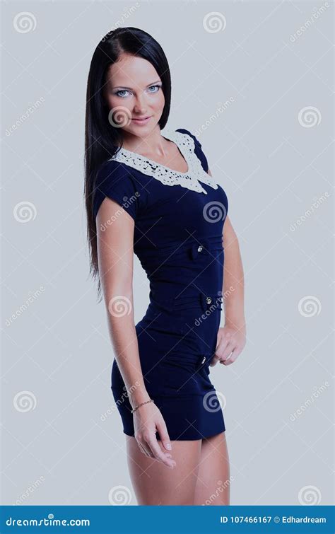 Young Brunette Lady In Blue Dress Posing On White Background Stock