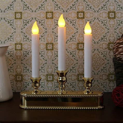 That would be a great feature, and is, unfortunately our electric window candles have a warm soft light (you can also exchange the bulbs, size c7) for. Electric Window Candles and Christmas Candelabras | Lights.com