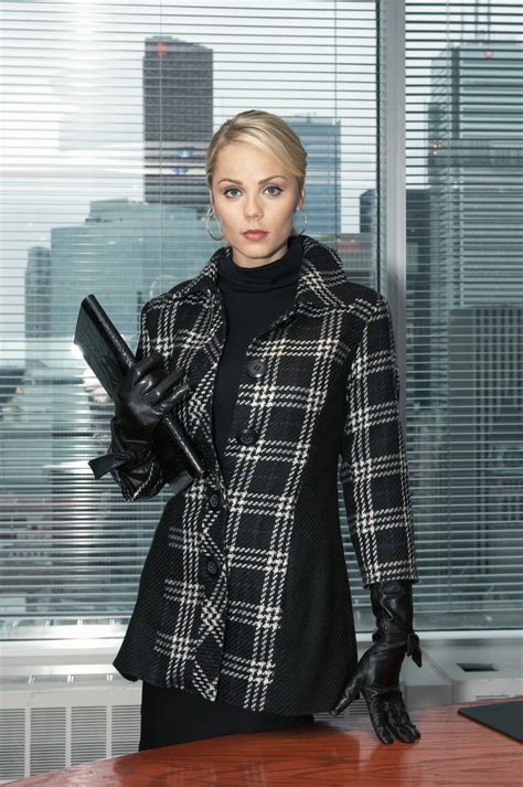 Celebrities In Gloves — Laura Vandervoort Wearing Leather Gloves In
