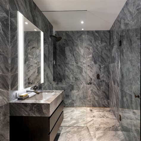 Ten Bathrooms That Celebrate The Variety Of Veiny Marble Architecture