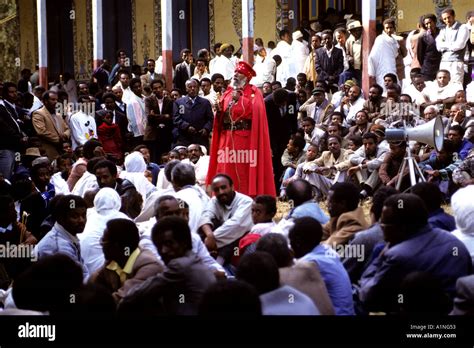 Red Clad Ethiopian Preacher At Feast Day Ceremonies At Addis Alem