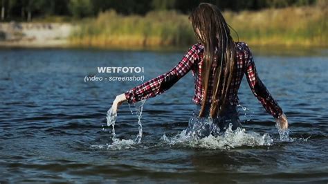 Swimming By Beautiful Girl In Soaking Wet Blue Jeans And Shoes On Lake Wetfoto Com