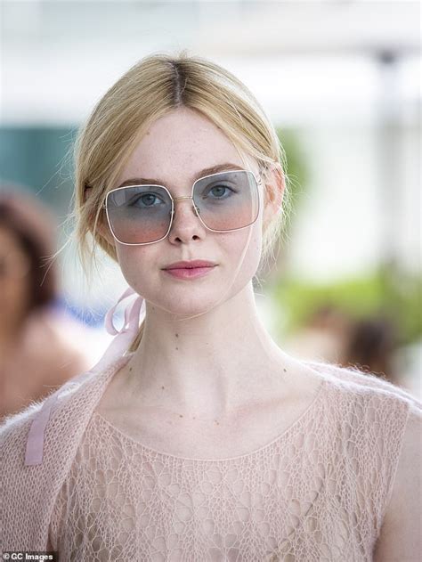 Elle Fanning Oozes Elegance In A Blush Hued Sheer Gown At Cannes Film